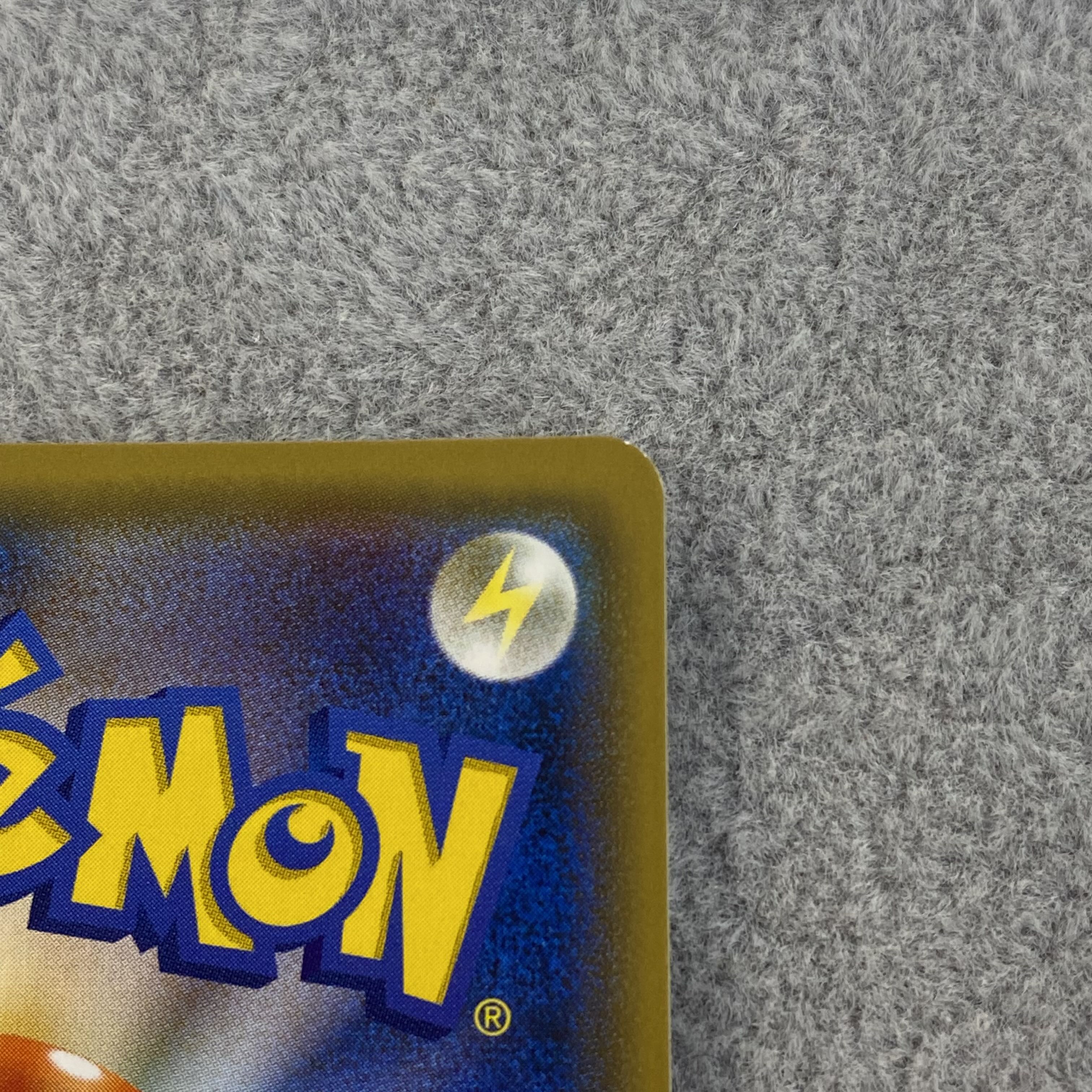 Pikachu PROMO 211/SM-P with cherry blossom afro