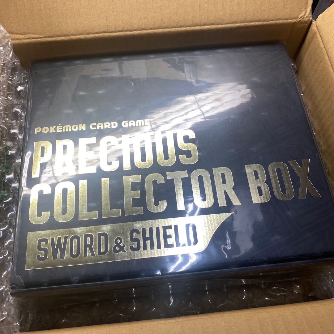 Precious collector box, unopened, shrink-wrapped.
