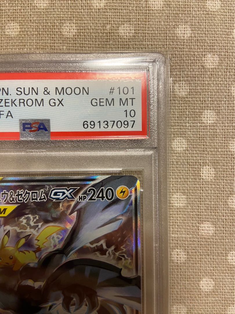 Pikachu & ZekromGX SR 101/095 PSA10