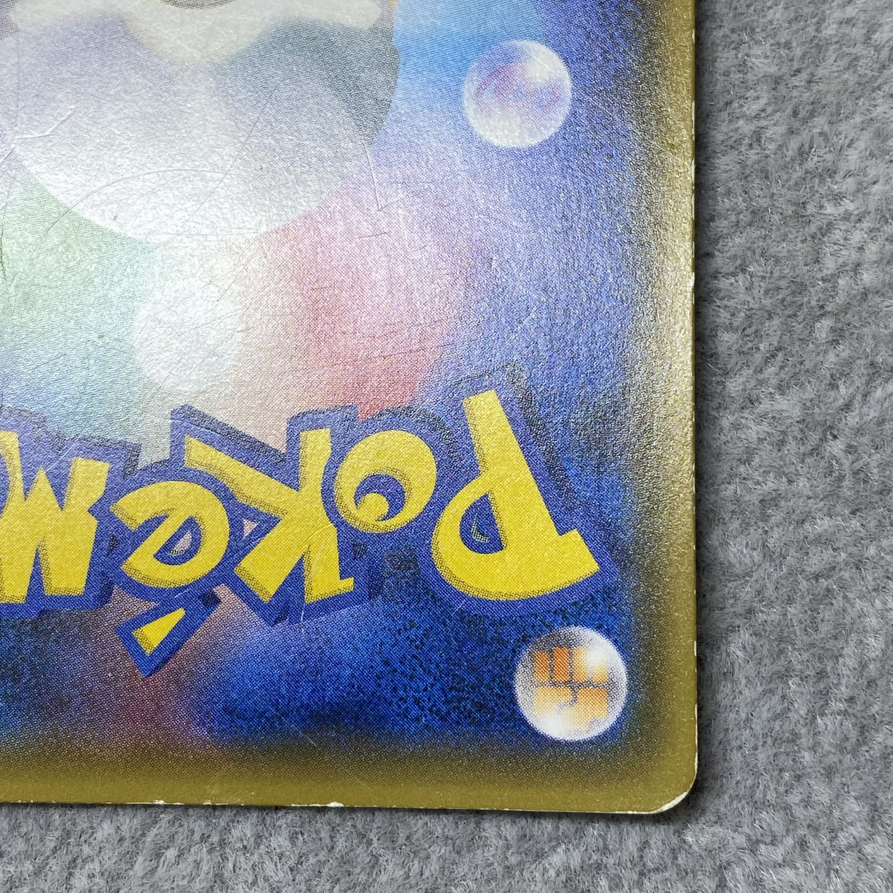 Pikachu PROMO 211/SM-P with cherry blossom afro