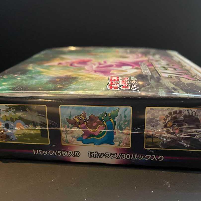 Space juggler box with shrink wrap