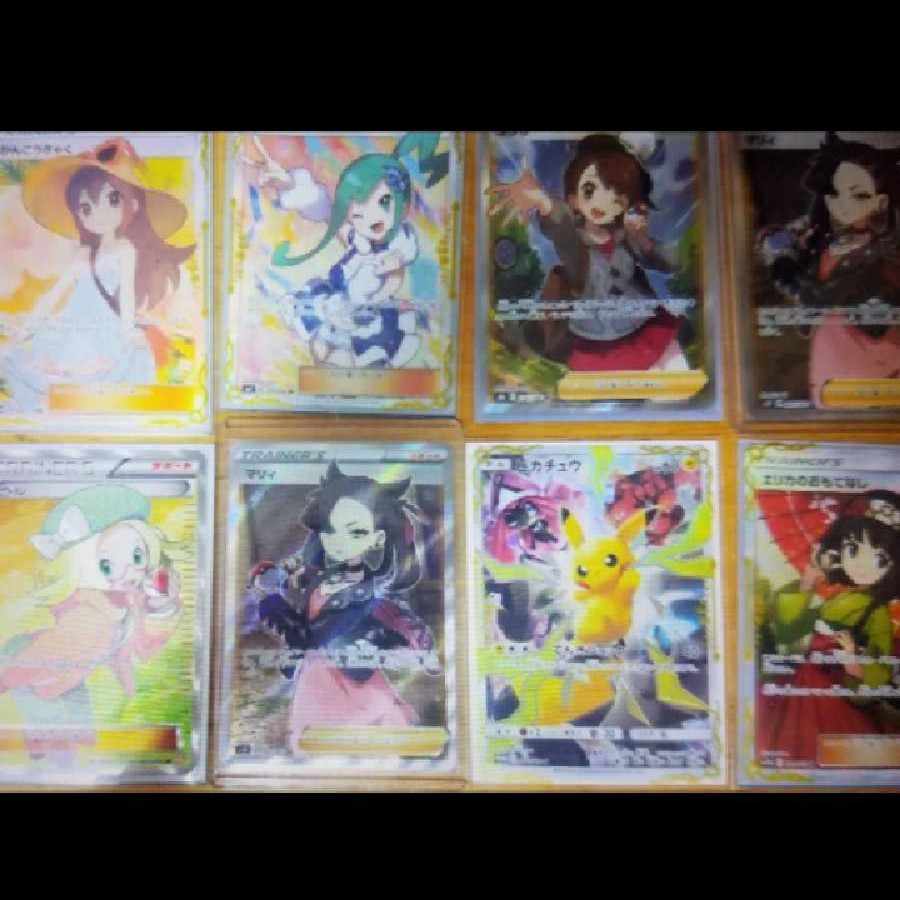 Three mouthfuls of Pokémon cards, one-half pack