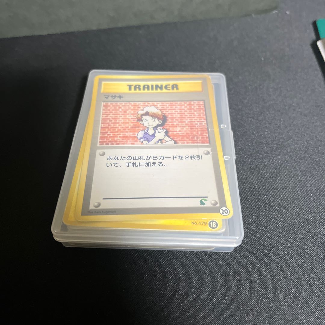 Retired Pokémon items for sale in bulk, including old backsides and various other items.