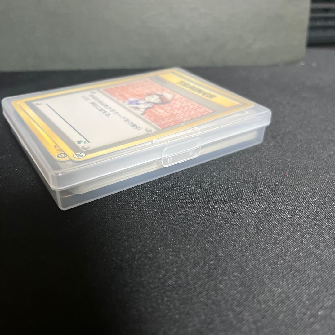 Retired Pokémon items for sale in bulk, including old backsides and various other items.