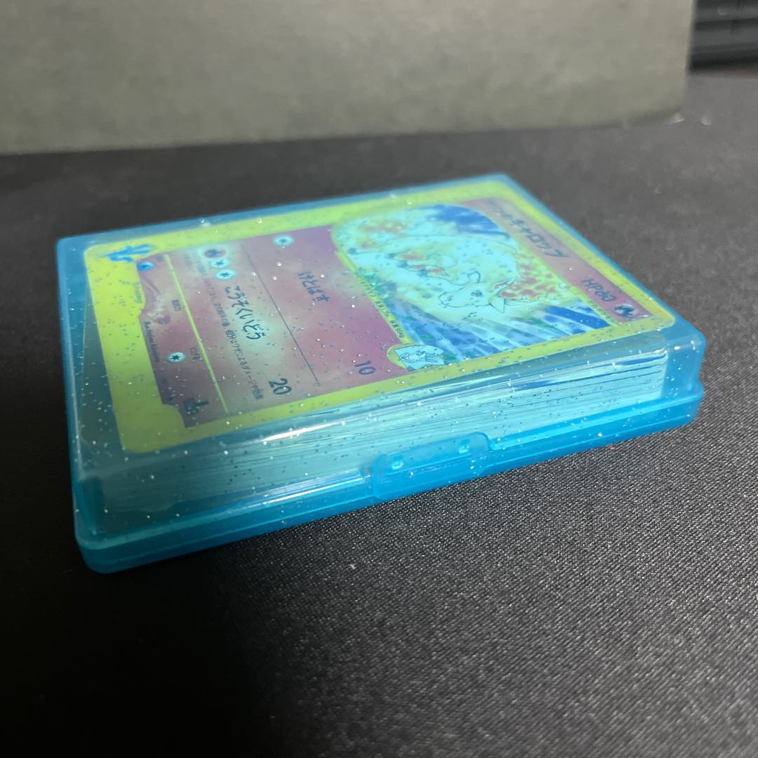 Retired Pokémon items for sale in bulk, including old backsides and various other items.