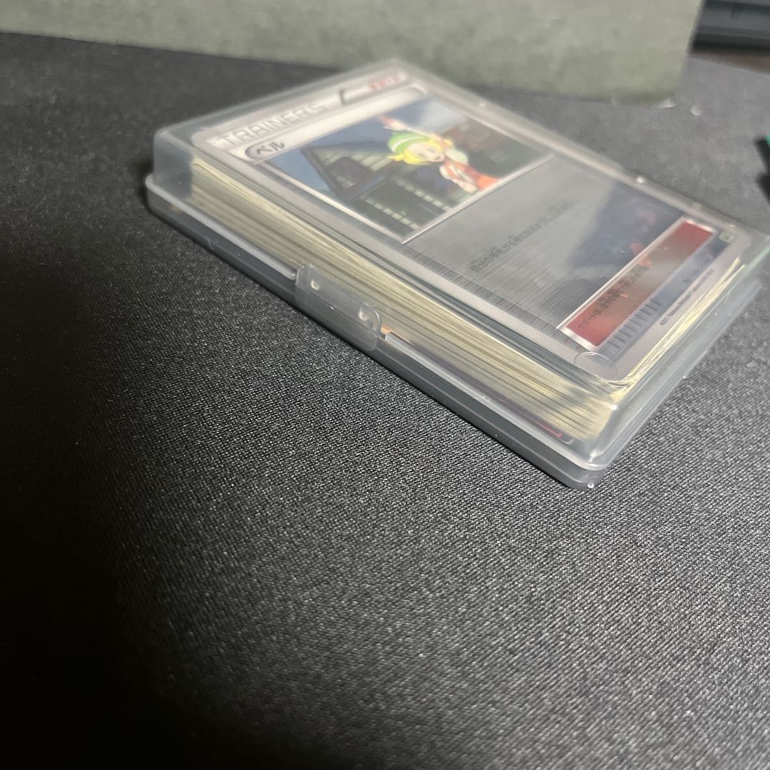 Retired Pokémon items for sale in bulk, including old backsides and various other items.