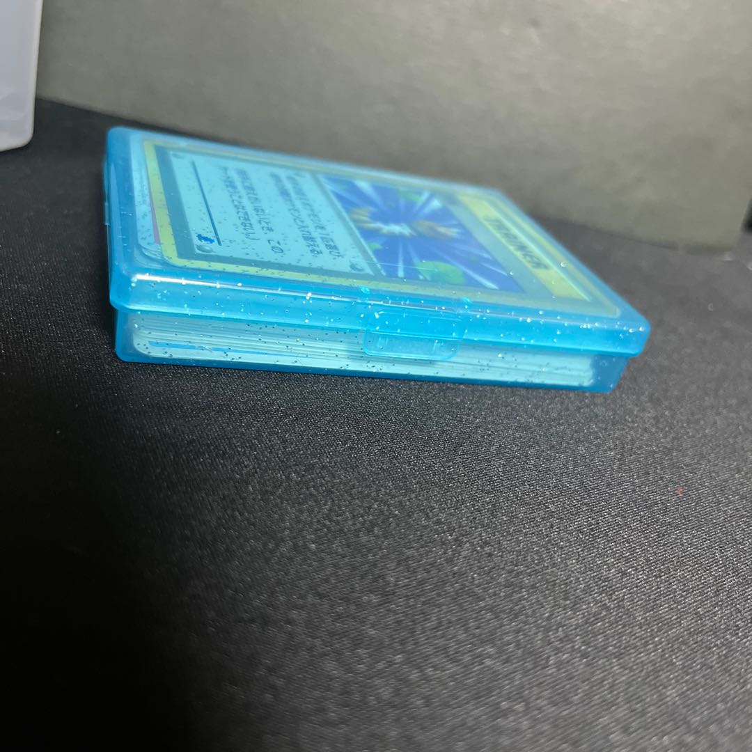 Retired Pokémon items for sale in bulk, including old backsides and various other items.