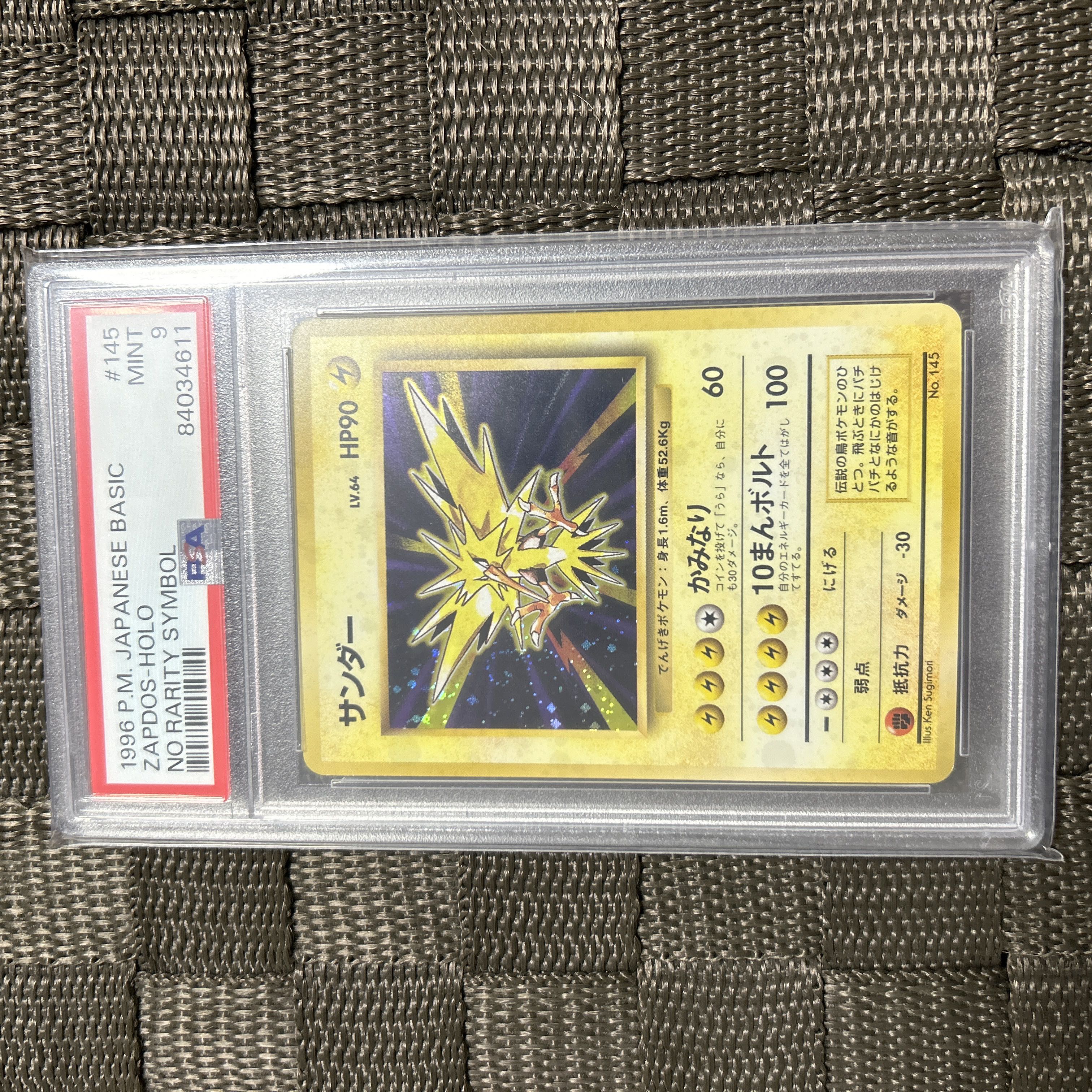 Zapdos old back, first edition PSA9