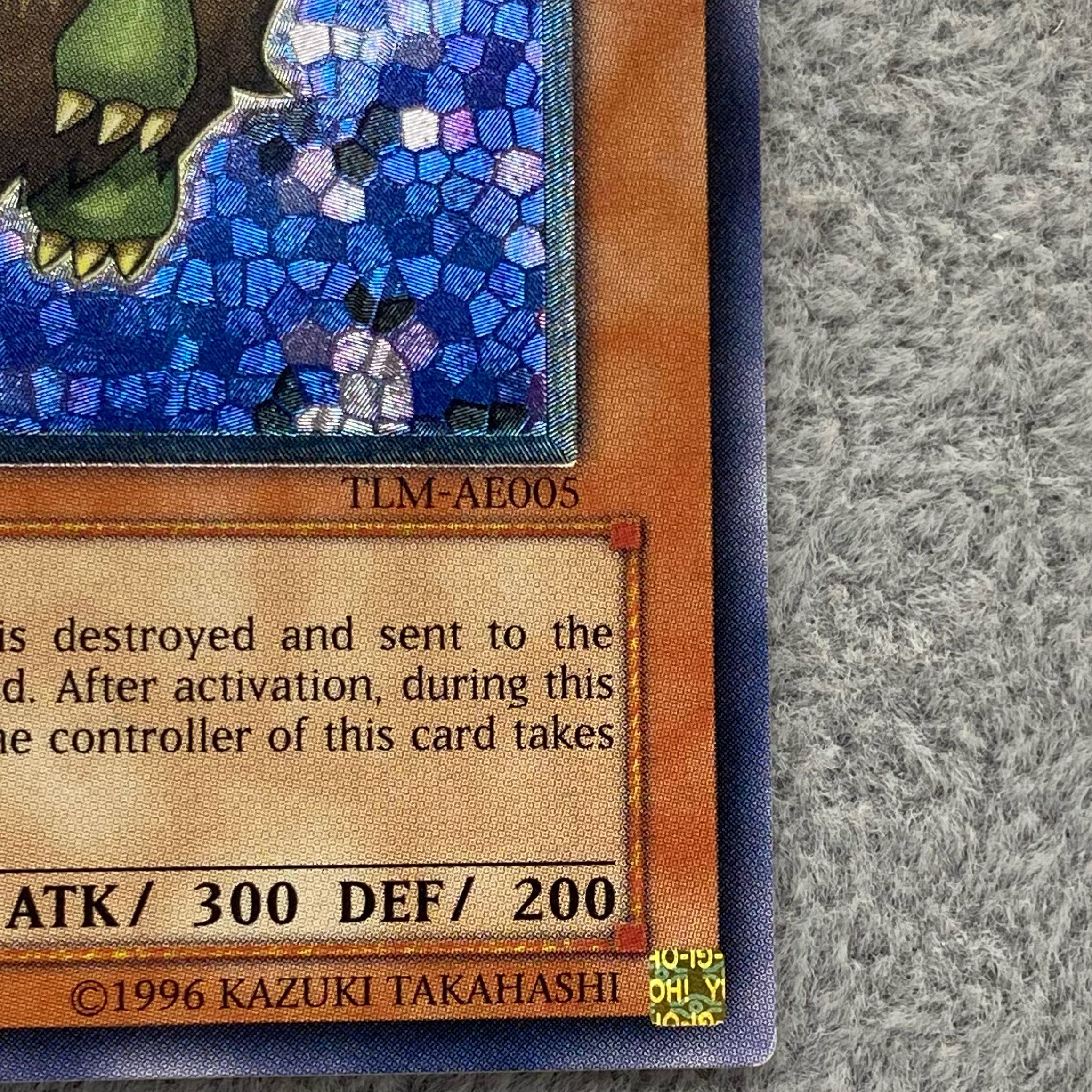 Winged Kuriboh Asia <1st> [relief] {TLM-AE005}.