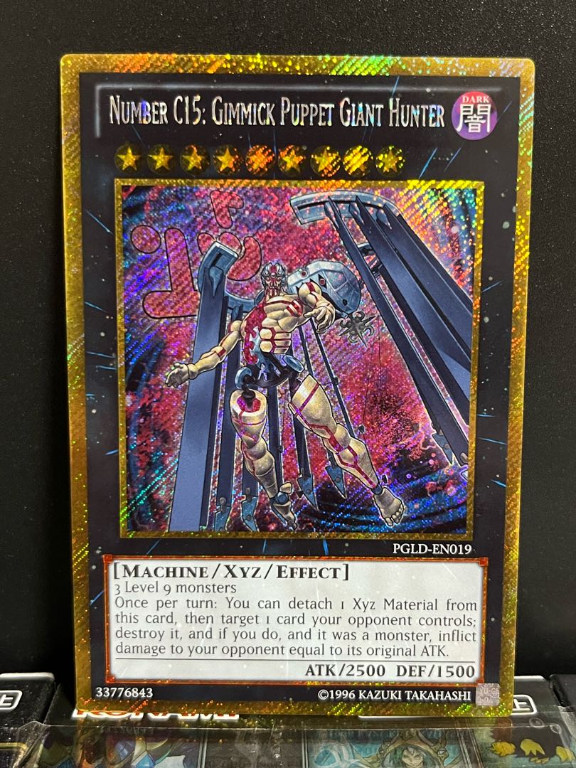 Yu-Gi-Oh Studio 10213 [English Version] CNo.15 Gimmick Puppet - Serial Killer Gold Secret Rare EN019 1 copy