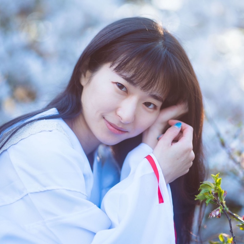 石山真美