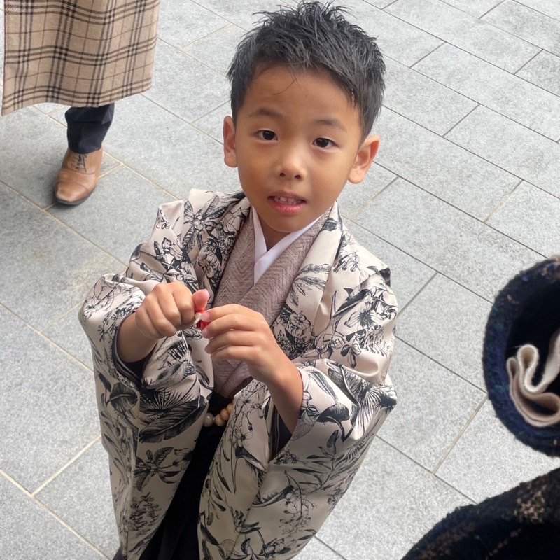 望月麻記人