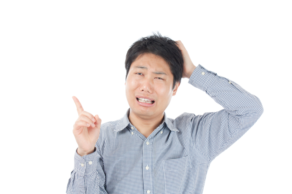 困っている男性