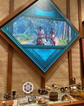 A picture of people riding bikes on a wall
Description automatically generated