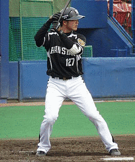 穴田真規の画像