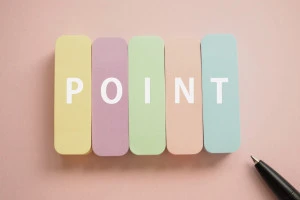 付箋にPOINTポイントの文字とペンの画像