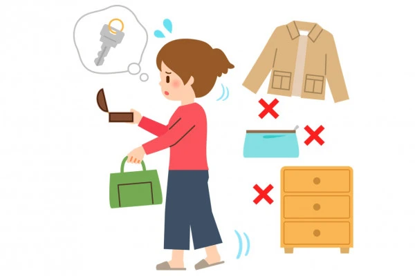 家の中で鍵を探し回る女性のイラスト