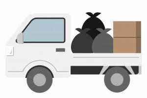 不用品を積んだ横向きの軽トラックのイラスト
