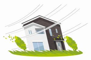 強風に吹かれる住宅のイラスト