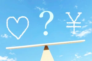 手描きのハートと円マークの文字とバランス板