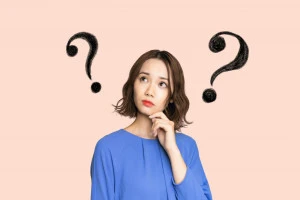 疑問を持つ女性の写真
