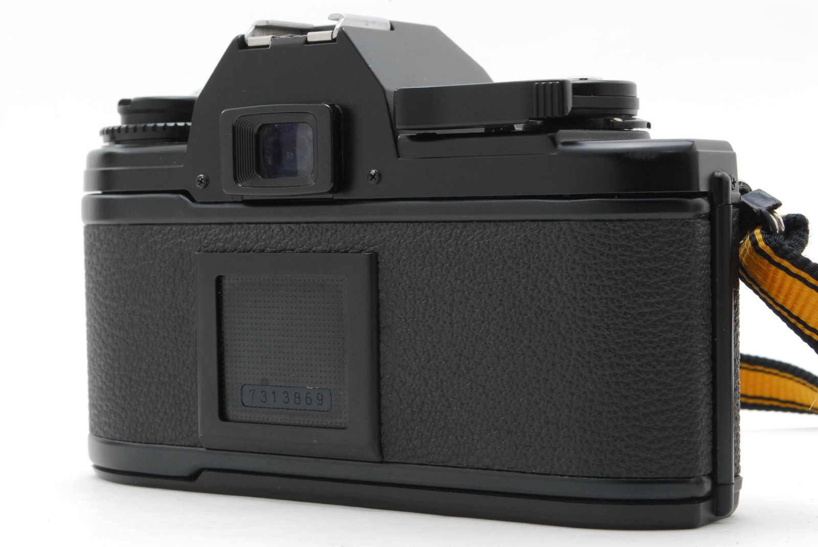 EXC] Nikon EM SLR Camera Black w/Tokina 55-70mm F4 Zoom Lens
