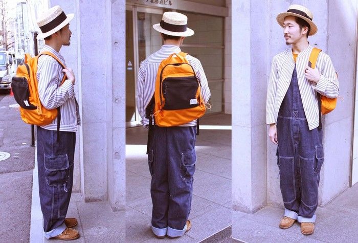 オーバーオールをおしゃれに着ている男性の写真