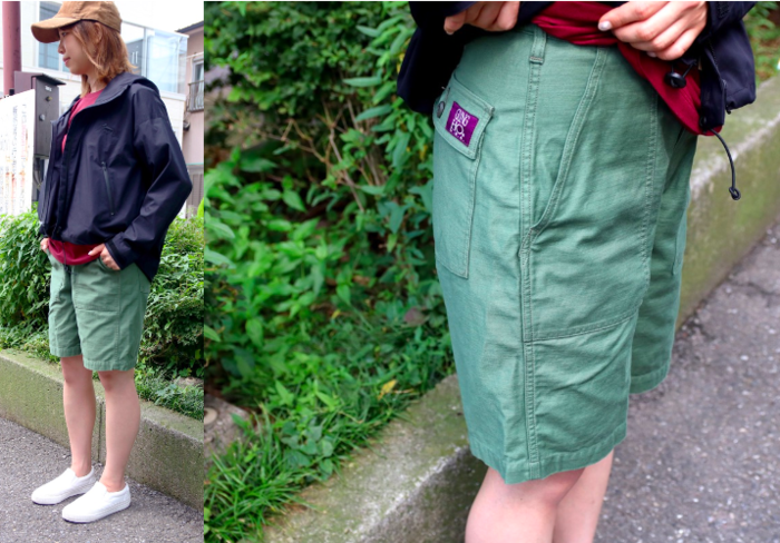 グリーンのハーフパンツを履いた女性の写真