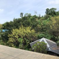 千葉県山武郡九十九里町粟生の売買物件/2階テラスからの景色。パーゴラと倉庫の屋根が見えますね