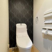 福岡市中央区大名の売買物件/お手洗い。アクセントクロスでちょっと個性的に。