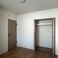 福岡市南区高宮の売買物件/キッチン横の洋室。