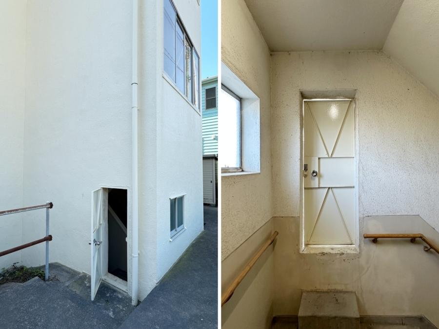 鎌倉市七里ガ浜二丁目の賃貸物件/左：階段の踊り場にあるドアの外に広がる共有スペース｜右：浮いているような小さいドア