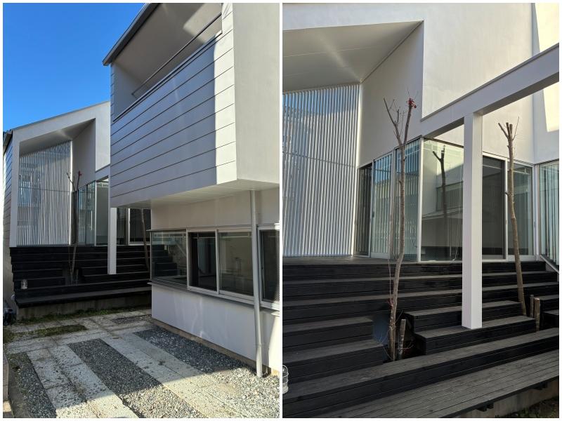 茅ヶ崎市浜竹二丁目の賃貸物件/外観。駐車スペースと、その奥に玄関。さらに先には階段があり、ウッドデッキへと繋がります