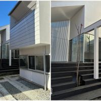 茅ヶ崎市浜竹二丁目の賃貸物件/外観。駐車スペースと、その奥に玄関。さらに先には階段があり、ウッドデッキへと繋がります