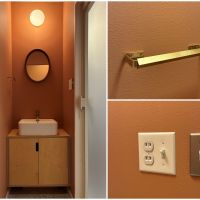 逗子市小坪二丁目の売買物件/洗面所｜テラコッタ色のアクセントクロスが可愛い。細かなパーツの選択にも遊び心を