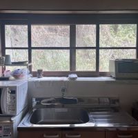 神戸市長田区西山町の売買物件/キッチンの窓からも山の景色