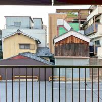 京都市中京区二条通油小路東入西大黒町の賃貸物件/2階西側｜正面はコインパーキングなので今のところ圧迫感は全くない。