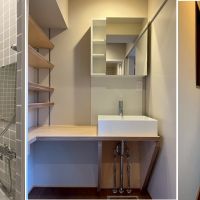 滋賀県大津市木下町7-32の売買物件/バスルームは淡いグレーのタイルに囲まれている