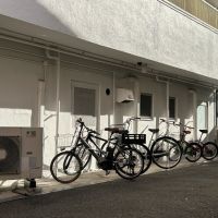 大阪市都島区都島中通の賃貸物件/建物裏にある入居者専用駐輪場。