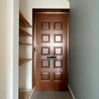 大阪府大阪市西区九条１丁目の賃貸物件/玄関扉はレトロな味わい。