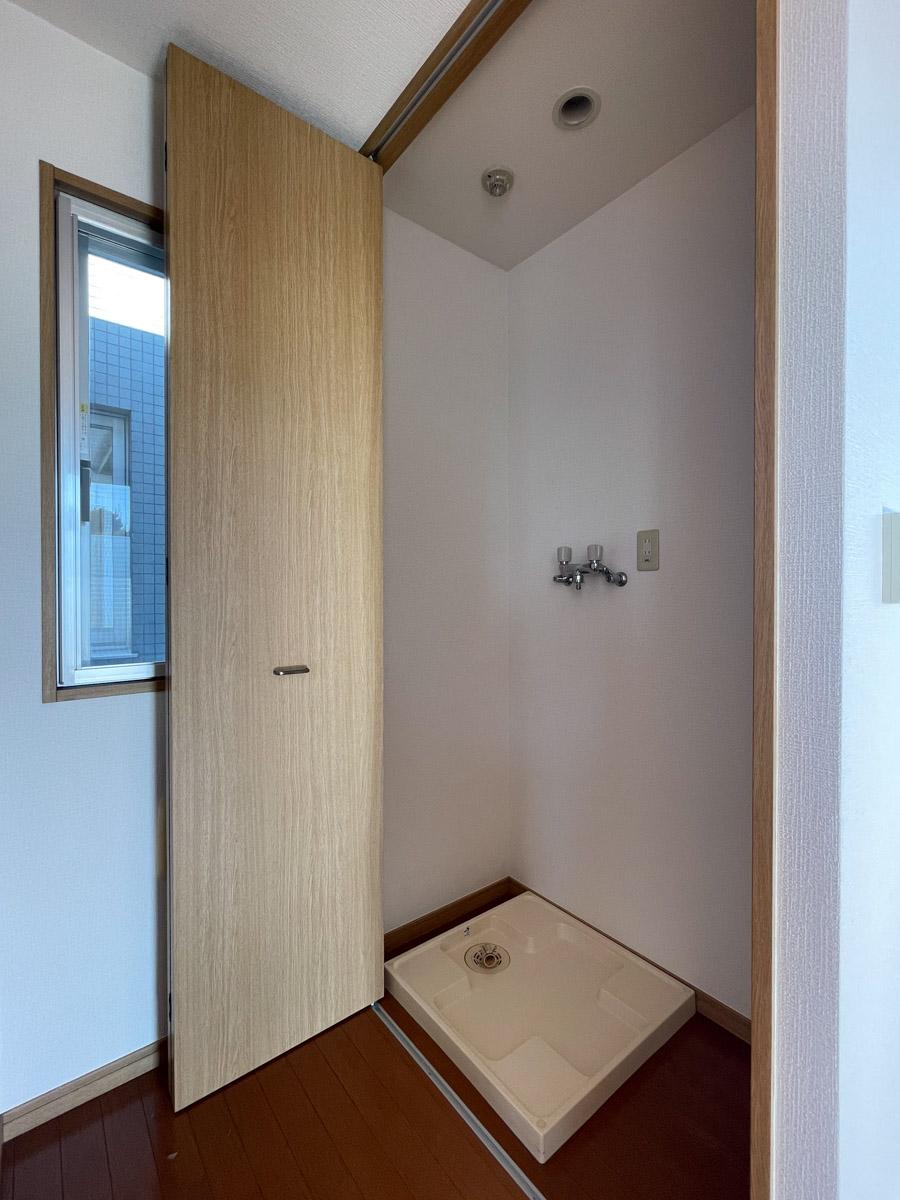 世田谷区弦巻の賃貸物件/キッチンの近くに洗濯機置き場
