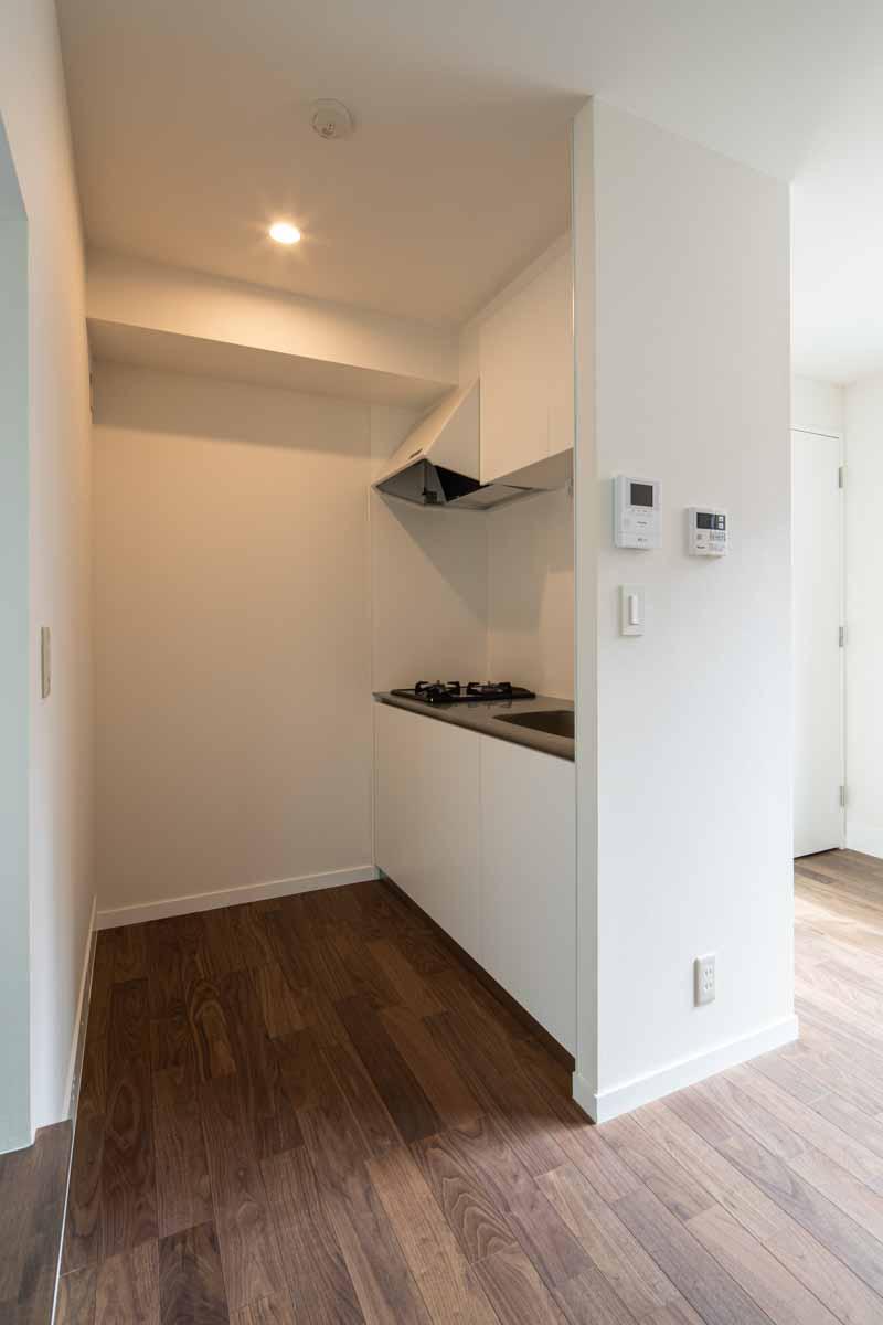 大田区山王の賃貸物件/キッチンはガス2口コンロ。壁で囲まれていることにより、生活感が隠せて嬉しい