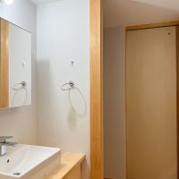 所沢市下安松の売買物件/洗面。奥がお手洗い