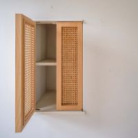 千葉県四街道市内黒田の売買物件/ラタンの造作扉でつくられた小物収納。ディテールにこだわりを感じます