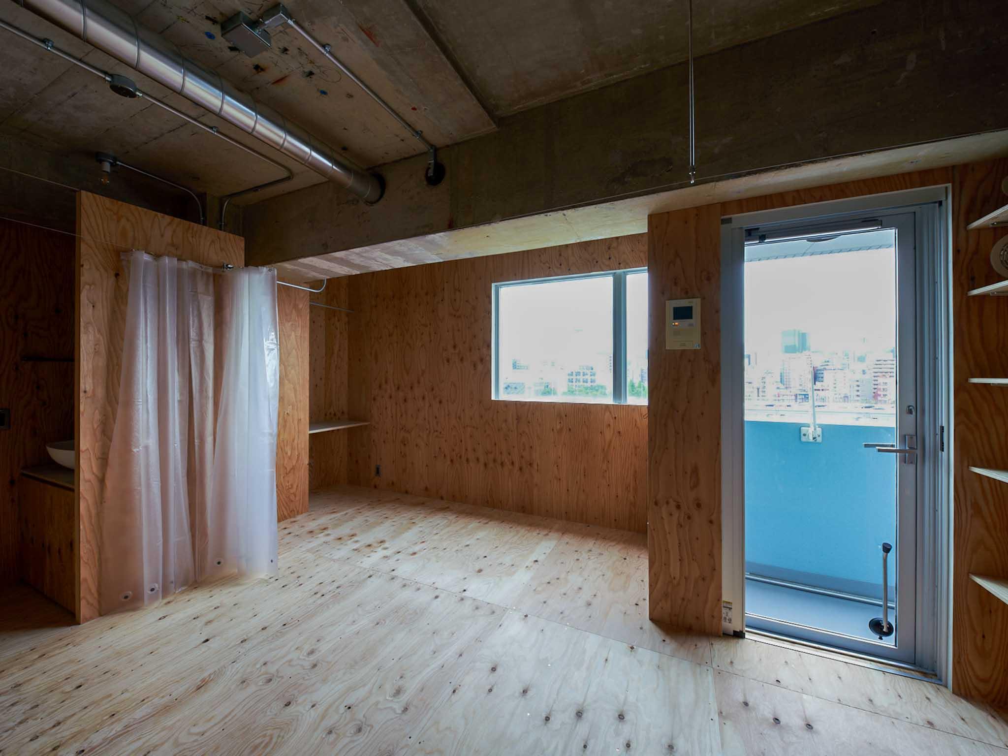 墨田区千歳の売買物件/窓際のスペースにベッドを置くイメージ