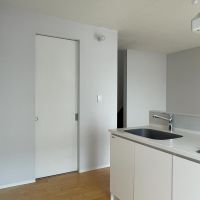 北区中里の賃貸物件/水まわりは扉の向こうにまとまって用意されています