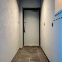 中央区月島の売買物件/玄関。床の質感もいい雰囲気です