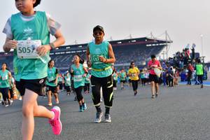 BIB: 5057, 0509
                            <button type="button" onclick="openModal(10560315)" class="btn btn-primary btn-sm float-right btn-popup" data-toggle="modal" data-target=".modal-high-quality">
                        <i class="fas fa-shopping-cart"></i> Add to Cart
                    </button>
                                            <button type="button" onclick="isThisMe(10560315, true)" class="btn btn-success btn-sm float-right btn-popup btn-isme hidden" data-toggle="tooltip" data-placement="bottom" title="นี่คือรูปของคุณใช่ไหม คลิกที่นี่เพื่อเอาเข้าอัลบั้ม">
                        <i class="fas fa-plus"></i> Add to album
                    </button>
                    <button type="button" onclick="isThisMe(10560315, false)" class="btn btn-warning btn-sm float-right btn-popup btn-isnotme hidden">
                        <i class="fas fa-ban"></i> Remove from album
                    </button>