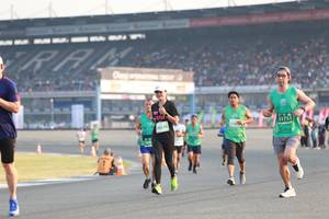 BIB: 0618, 51751, 524, 500
                            <button type="button" onclick="openModal(10557884)" class="btn btn-primary btn-sm float-right btn-popup" data-toggle="modal" data-target=".modal-high-quality">
                        <i class="fas fa-shopping-cart"></i> Add to Cart
                    </button>
                                            <button type="button" onclick="isThisMe(10557884, true)" class="btn btn-success btn-sm float-right btn-popup btn-isme hidden" data-toggle="tooltip" data-placement="bottom" title="นี่คือรูปของคุณใช่ไหม คลิกที่นี่เพื่อเอาเข้าอัลบั้ม">
                        <i class="fas fa-plus"></i> Add to album
                    </button>
                    <button type="button" onclick="isThisMe(10557884, false)" class="btn btn-warning btn-sm float-right btn-popup btn-isnotme hidden">
                        <i class="fas fa-ban"></i> Remove from album
                    </button>