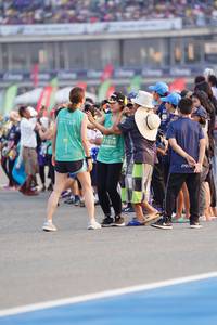 BIB: 71018
                            <button type="button" onclick="openModal(10493715)" class="btn btn-primary btn-sm float-right btn-popup" data-toggle="modal" data-target=".modal-high-quality">
                        <i class="fas fa-shopping-cart"></i> Add to Cart
                    </button>
                                            <button type="button" onclick="isThisMe(10493715, true)" class="btn btn-success btn-sm float-right btn-popup btn-isme hidden" data-toggle="tooltip" data-placement="bottom" title="นี่คือรูปของคุณใช่ไหม คลิกที่นี่เพื่อเอาเข้าอัลบั้ม">
                        <i class="fas fa-plus"></i> Add to album
                    </button>
                    <button type="button" onclick="isThisMe(10493715, false)" class="btn btn-warning btn-sm float-right btn-popup btn-isnotme hidden">
                        <i class="fas fa-ban"></i> Remove from album
                    </button>